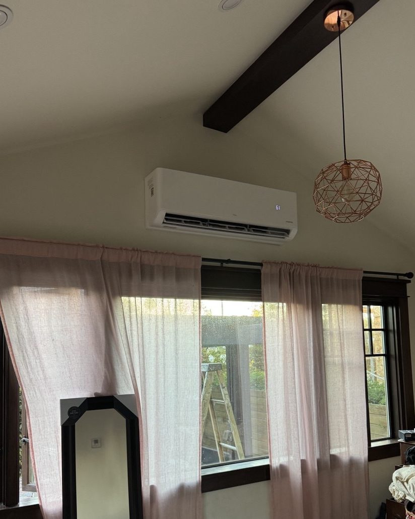 Mini split in a vaulted bedroom